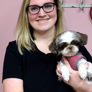 Team Member at NW Pet Resort Holding Dog